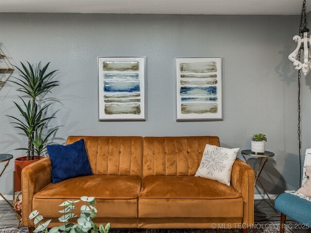 2016 W Easton St, Tulsa, OK 74127 - living room featuring baseboards