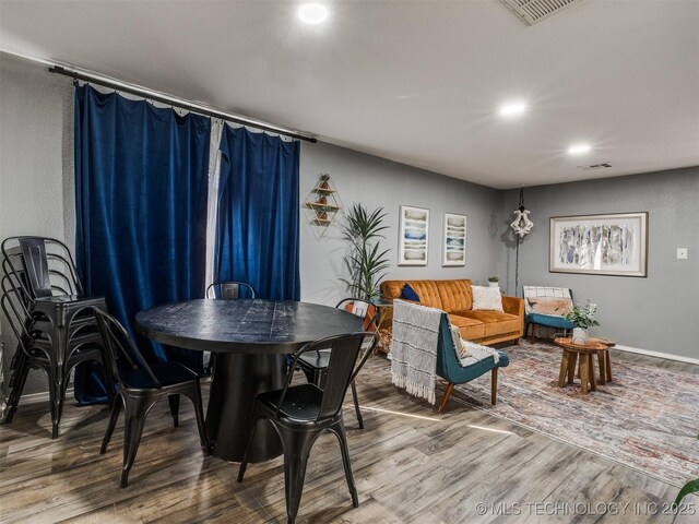 2016 W Easton St, Tulsa, OK 74127 - dining area with wood finished floors and recessed lighting