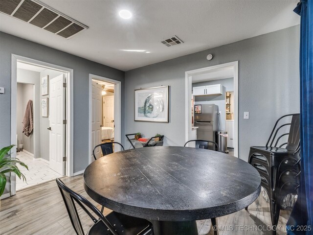 2016 W Easton St, Tulsa, OK 74127 - dining room featuring light wood finished floors and baseboards