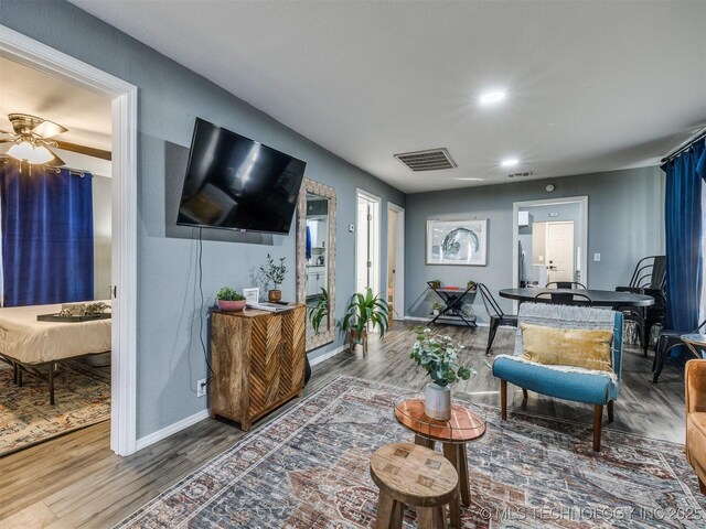 2016 W Easton St, Tulsa, OK 74127 - living area with wood finished floors, recessed lighting, and ceiling fan