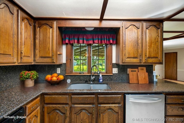 1943 W 163rd St, Skiatook, OK 74070 - kitchen featuring stainless steel dishwasher, decorative backsplash, brown cabinets, and dark stone counters