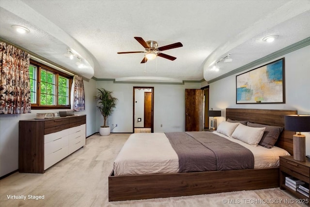 1943 W 163rd St, Skiatook, OK 74070 - bedroom with a textured ceiling, ornamental molding, and a ceiling fan