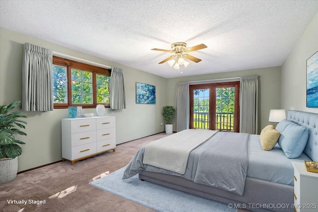 1943 W 163rd St, Skiatook, OK 74070 - bedroom featuring light colored carpet, a textured ceiling, ceiling fan, and access to outside