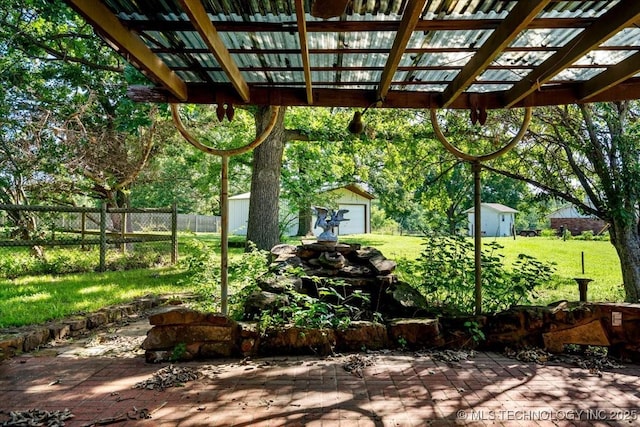 1943 W 163rd St, Skiatook, OK 74070 - view of patio featuring a storage unit and a pergola