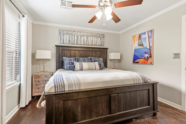 1628 E 45th Pl, Tulsa, OK 74105 - bedroom with dark wood-style floors, ornamental molding, and a ceiling fan