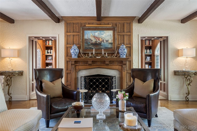 1249 E 26th St, Tulsa, OK 74114 - living area with a textured wall and beamed ceiling