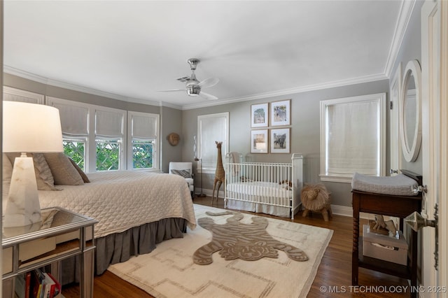 1249 E 26th St, Tulsa, OK 74114 - bedroom featuring wood finished floors, crown molding, and ceiling fan
