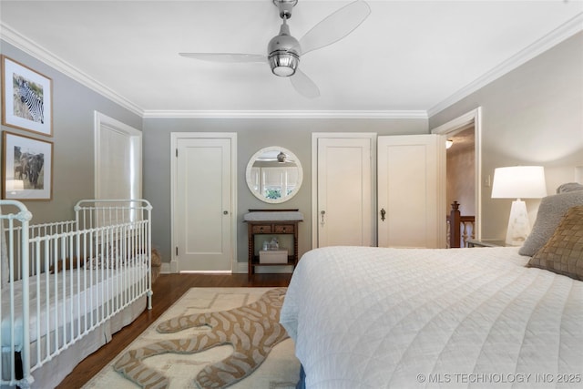 1249 E 26th St, Tulsa, OK 74114 - bedroom with wood finished floors, crown molding, and a ceiling fan