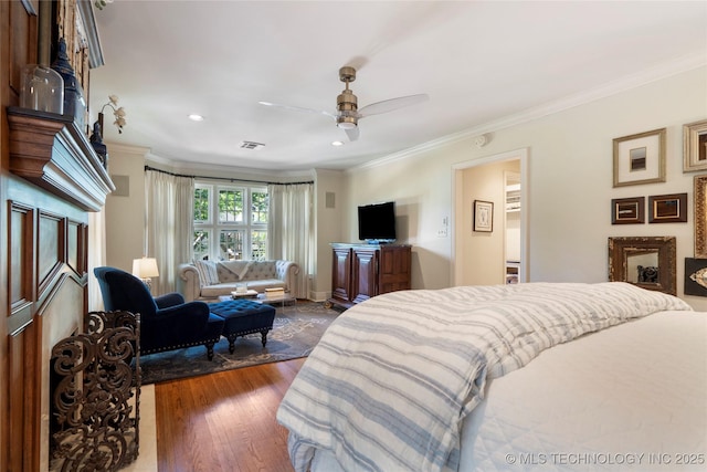 1249 E 26th St, Tulsa, OK 74114 - bedroom with ornamental molding, dark wood-type flooring, recessed lighting, and a ceiling fan