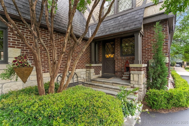 1249 E 26th St, Tulsa, OK 74114 - property entrance featuring brick siding