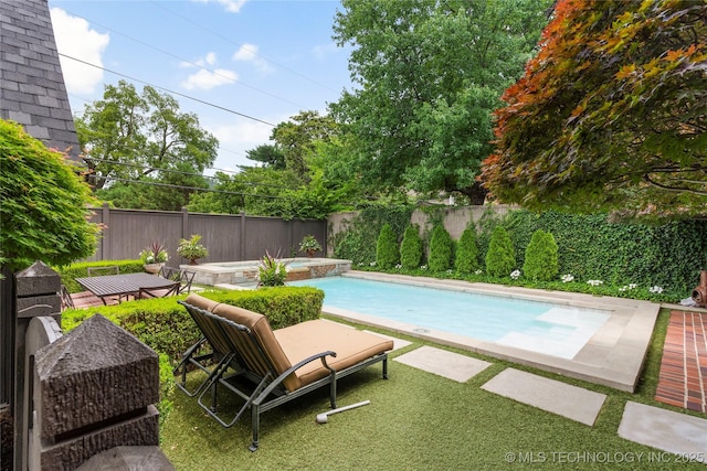 1249 E 26th St, Tulsa, OK 74114 - view of swimming pool featuring a fenced backyard and a pool with connected hot tub