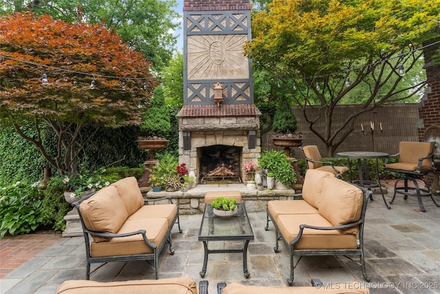1249 E 26th St, Tulsa, OK 74114 - view of patio featuring an outdoor living space with a fireplace