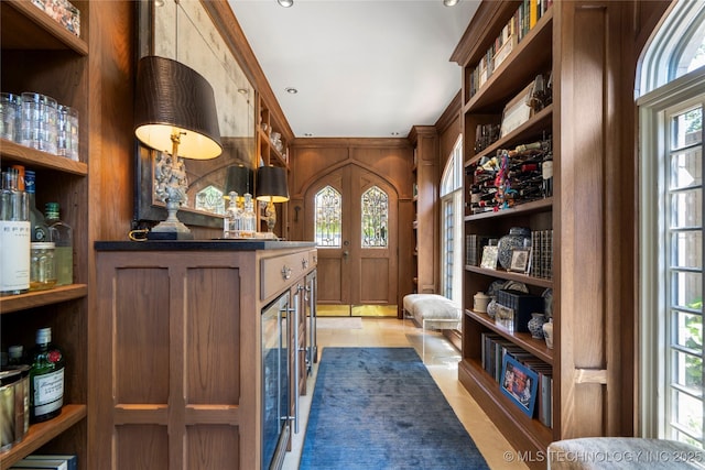 1249 E 26th St, Tulsa, OK 74114 - foyer featuring healthy amount of natural light and a bar