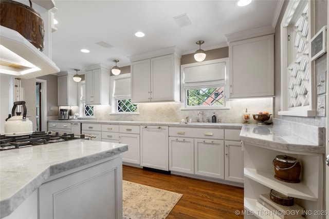 1249 E 26th St, Tulsa, OK 74114 - kitchen with dishwasher, decorative backsplash, white cabinetry, dark wood-style flooring, and ornamental molding