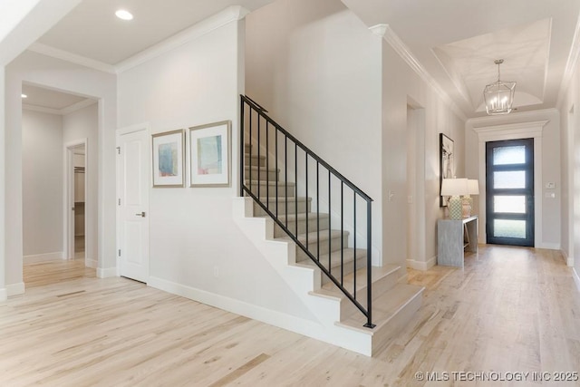 6501 S Fir Ave, Broken Arrow, OK 74134 - foyer with wood finished floors, a chandelier, stairs, crown molding, and recessed lighting