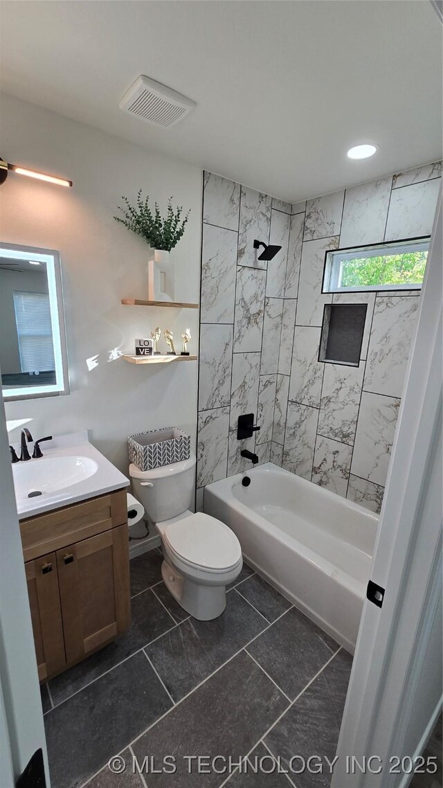 1135 E Zion St, Tulsa, OK 74106 - full bathroom with vanity, shower / tub combination, and tile patterned flooring