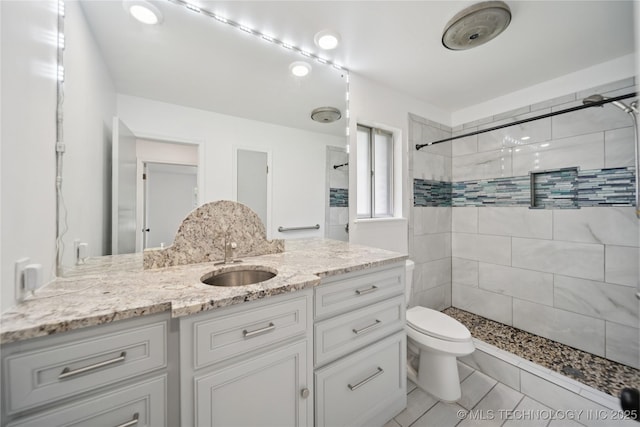10905 E 24th St, Tulsa, OK 74129 - full bathroom featuring vanity, a tile shower, and tile patterned floors