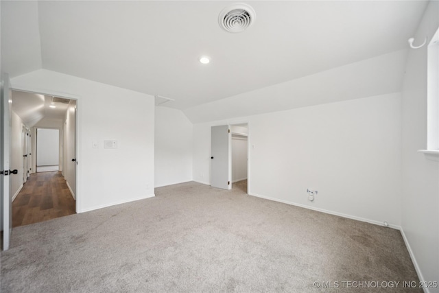 10905 E 24th St, Tulsa, OK 74129 - bonus room featuring vaulted ceiling, carpet flooring, and recessed lighting
