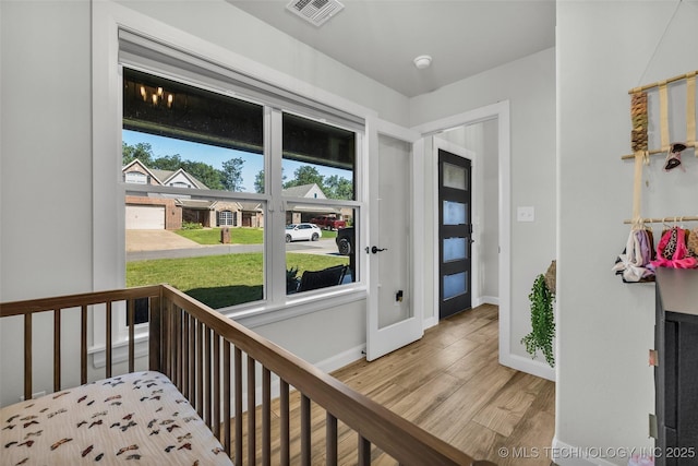 25133 Shade Tree Pl, Claremore, OK 74019 - bedroom featuring baseboards and wood finished floors