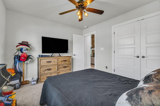 25133 Shade Tree Pl, Claremore, OK 74019 - carpeted bedroom with a ceiling fan and a closet