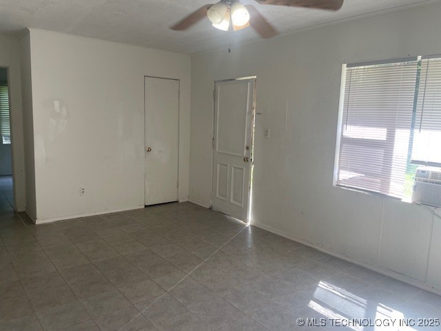 720 B NE, Ardmore, OK 73401 - spare room with a ceiling fan