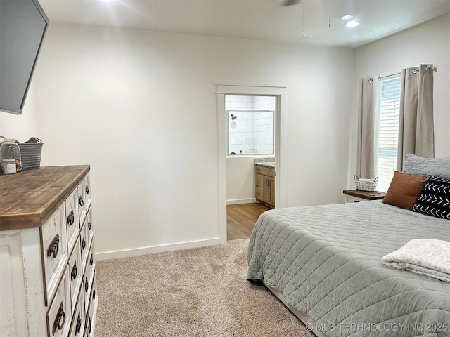 775 E Finley Ridge Dr, Tahlequah, OK 74464 - carpeted bedroom with ensuite bath and recessed lighting