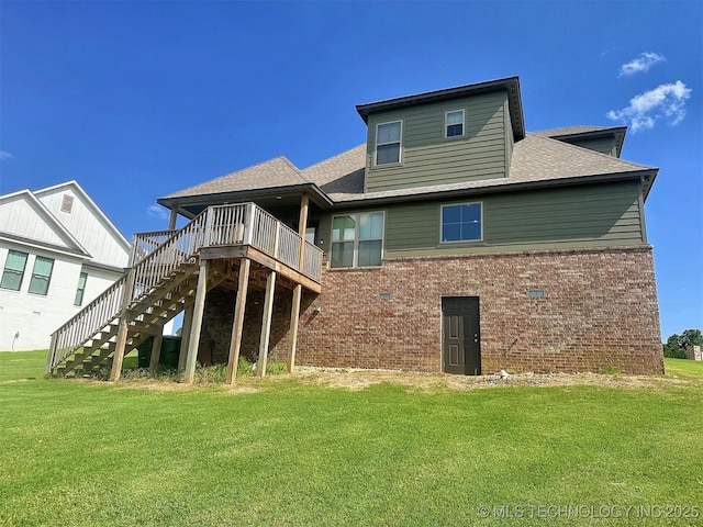 775 E Finley Ridge Dr, Tahlequah, OK 74464 - rear view of house with brick siding, stairs, a yard, and a shingled roof