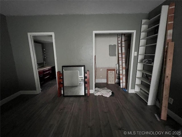 13226 N 91st Ave E, Collinsville, OK 74021 - unfurnished bedroom with dark wood finished floors and baseboards