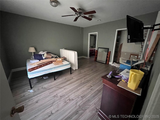 13226 N 91st Ave E, Collinsville, OK 74021 - bedroom featuring wood finished floors and baseboards