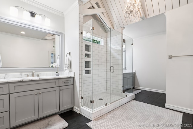 7604 S 6th St, Broken Arrow, OK 74011 - bathroom with ornamental molding, vanity, a shower stall, a chandelier, and wood finished floors