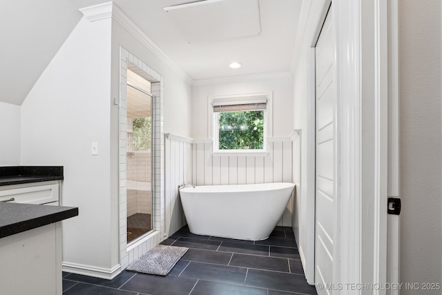 7604 S 6th St, Broken Arrow, OK 74011 - full bathroom featuring vanity, a freestanding bath, a stall shower, tile patterned floors, and crown molding