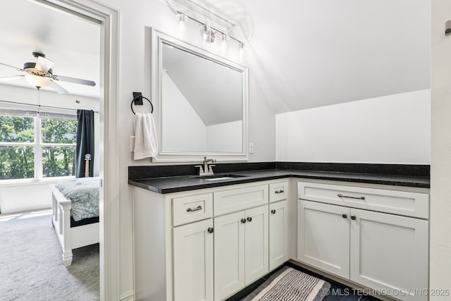 7604 S 6th St, Broken Arrow, OK 74011 - bathroom featuring vanity, ceiling fan, and lofted ceiling