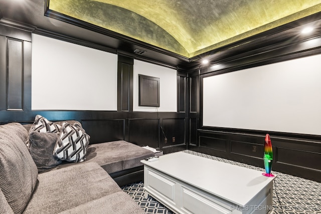 7604 S 6th St, Broken Arrow, OK 74011 - home theater room featuring a decorative wall, lofted ceiling, and crown molding