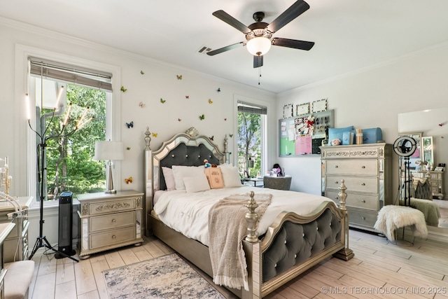 7604 S 6th St, Broken Arrow, OK 74011 - bedroom with ornamental molding, light wood-style flooring, multiple windows, and a ceiling fan