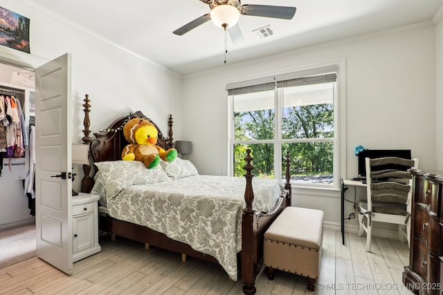 7604 S 6th St, Broken Arrow, OK 74011 - bedroom with light wood finished floors, ornamental molding, and a ceiling fan