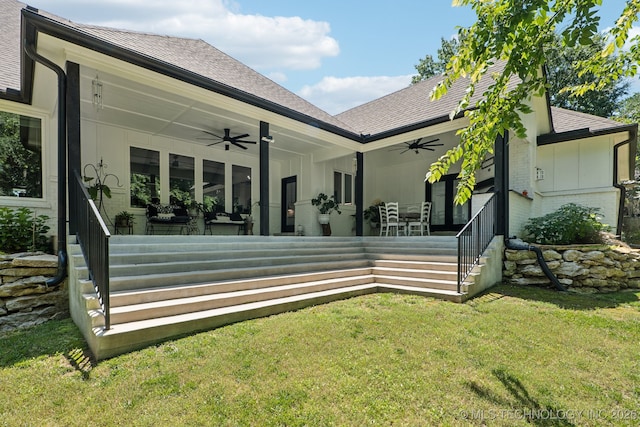 7604 S 6th St, Broken Arrow, OK 74011 - rear view of property with ceiling fan, brick siding, a shingled roof, and a lawn