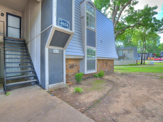 4654 E 68th St S Unit 199, Tulsa, OK 74136 - view of property with stairs