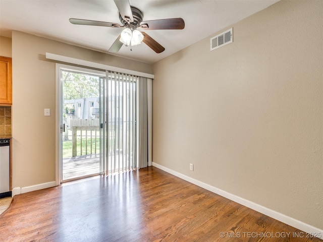 4654 E 68th St S Unit 199, Tulsa, OK 74136 - unfurnished room featuring a ceiling fan and wood finished floors