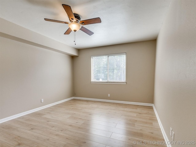 4654 E 68th St S Unit 199, Tulsa, OK 74136 - spare room with a ceiling fan and light wood-style floors