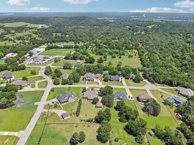 13614 W 42nd Pl, Sand Springs, OK 74063 - aerial view of residential area with a heavily wooded area