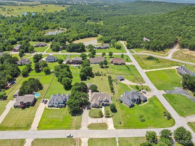13614 W 42nd Pl, Sand Springs, OK 74063 - aerial perspective of suburban area with a forest