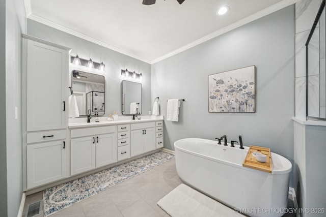 13614 W 42nd Pl, Sand Springs, OK 74063 - full bathroom with a ceiling fan, double vanity, a freestanding tub, crown molding, and a shower