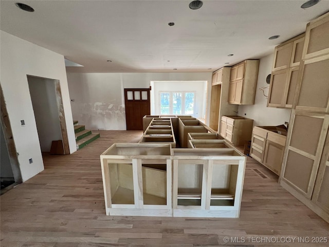 4949 S Boston Pl, Tulsa, OK 74105 - kitchen with a kitchen island, light wood-style floors, and recessed lighting