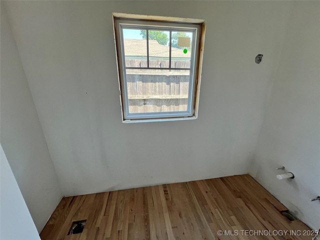 4949 S Boston Pl, Tulsa, OK 74105 - spare room with wood finished floors