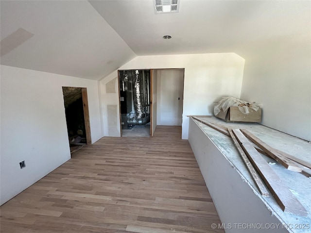 4949 S Boston Pl, Tulsa, OK 74105 - corridor with wood finished floors and lofted ceiling