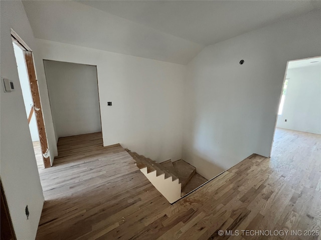 4949 S Boston Pl, Tulsa, OK 74105 - empty room with wood finished floors and vaulted ceiling
