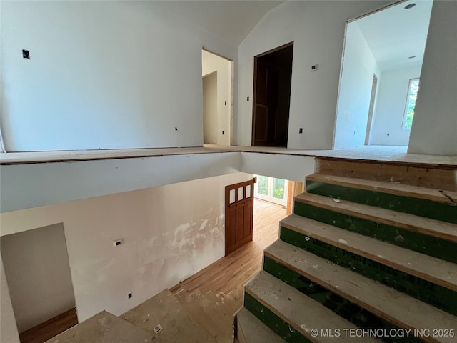 4949 S Boston Pl, Tulsa, OK 74105 - stairway featuring wood finished floors and lofted ceiling