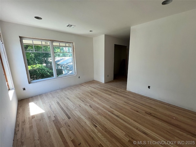 4949 S Boston Pl, Tulsa, OK 74105 - unfurnished room featuring wood finished floors