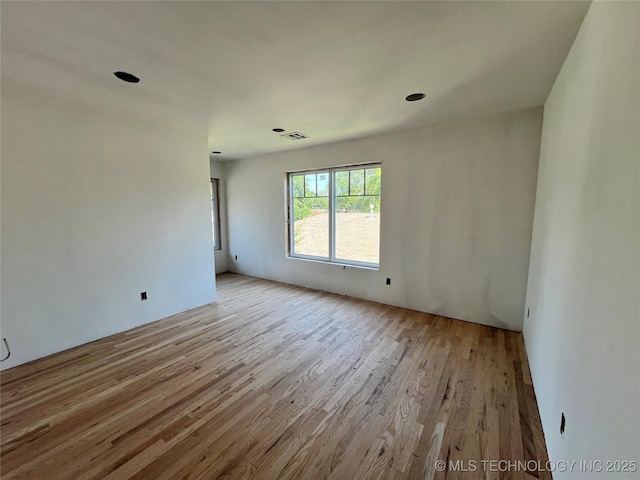 4949 S Boston Pl, Tulsa, OK 74105 - empty room featuring light wood finished floors
