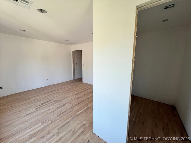 4949 S Boston Pl, Tulsa, OK 74105 - spare room featuring wood finished floors